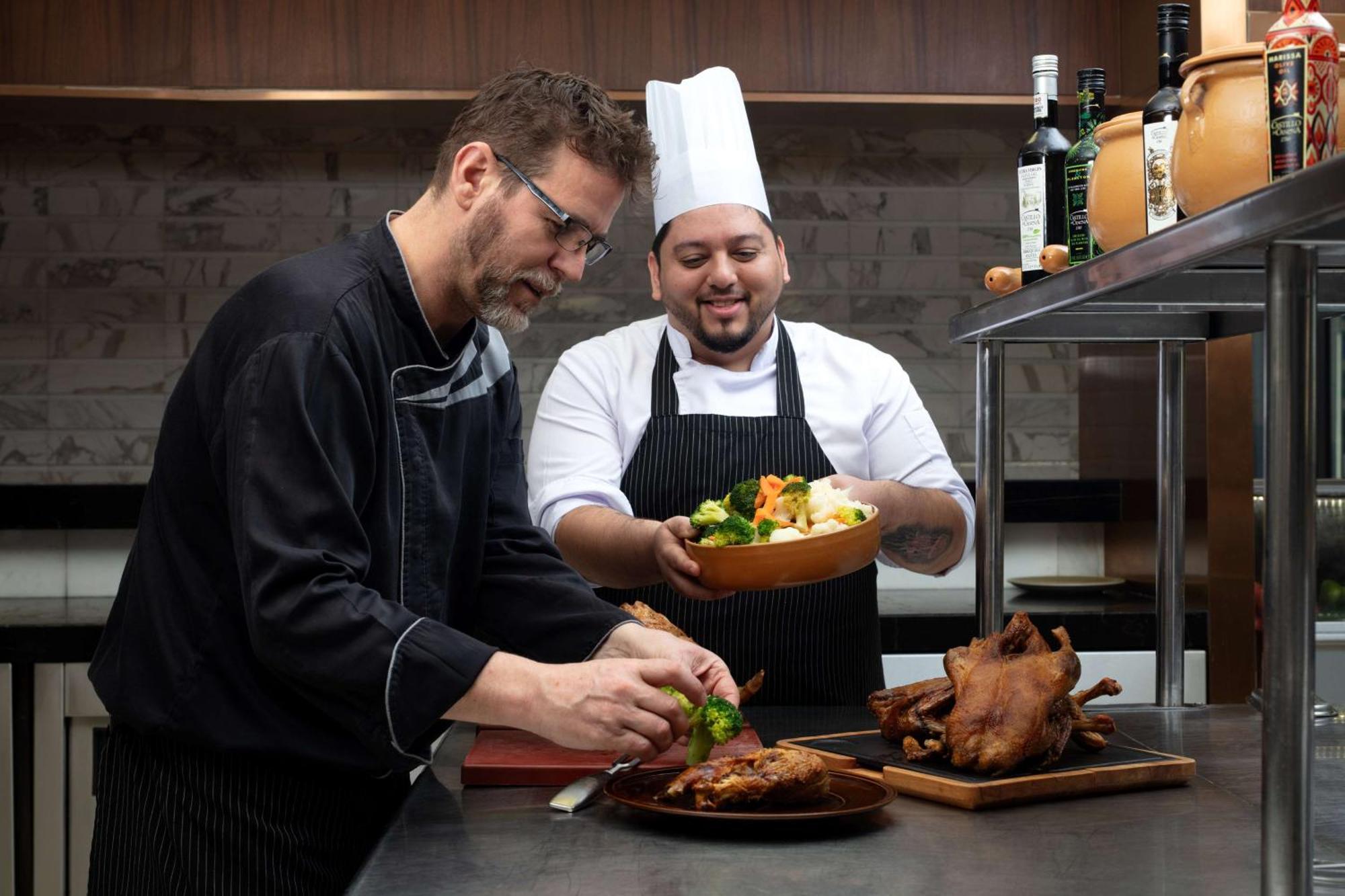 Hyatt Regency Riyadh Olaya Exteriör bild Chef de cuisine (left) and sous-chef (right)